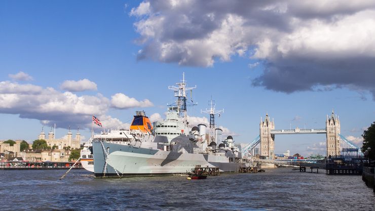 View of the HMS Belfast with the Tower of London and Tower Bridge in the background