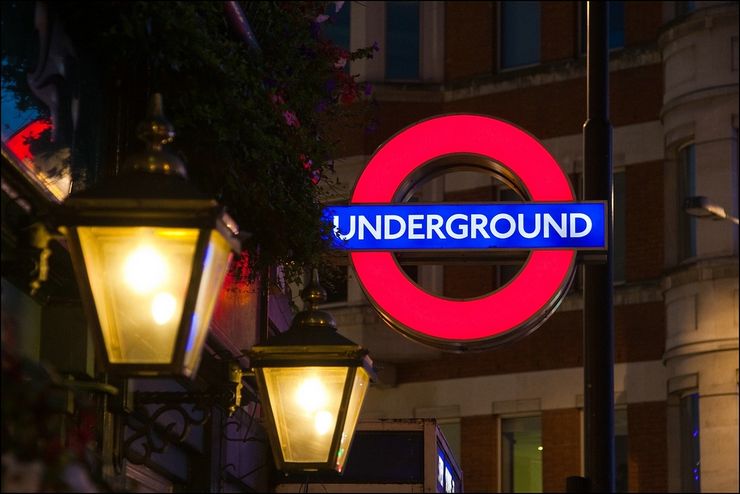 The very familiar sign indicating a station entrance along the London Underground