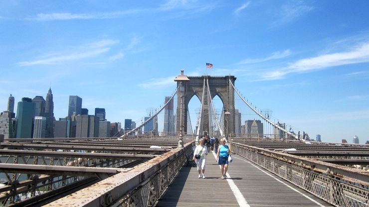 Enjoying a nice day walking across the Brooklyn Bridge