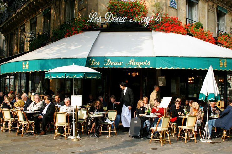 Sidewalk cafes are very popular in Paris