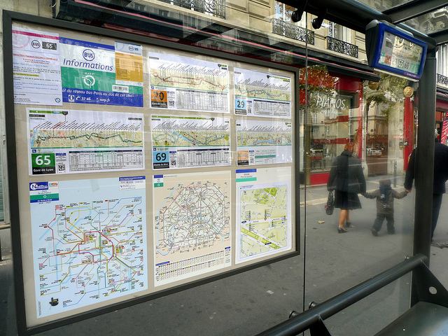 Very helpful signage and maps in a Paris bus stop shelter