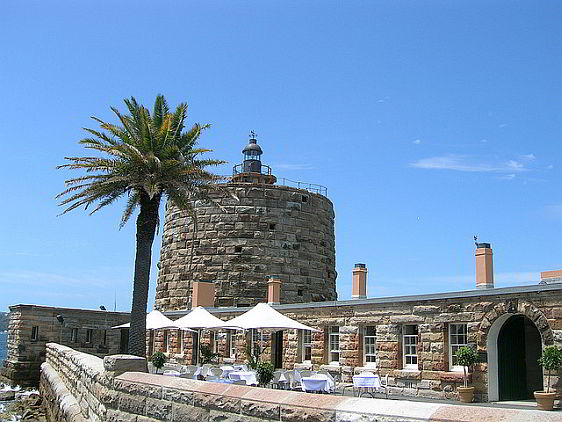 View of Fort Denison with the dining terrace in the foreground and the Martello tower in the background