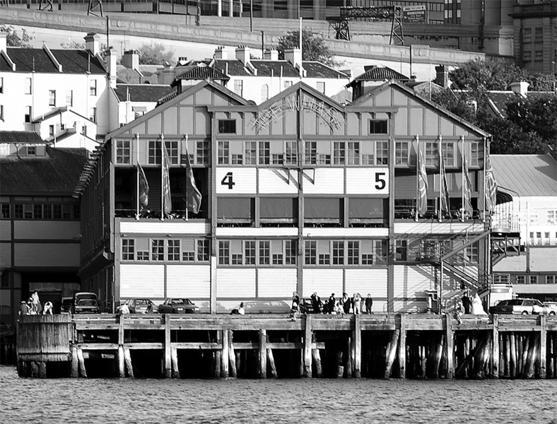 The Historic Wharf Theatre as seen from the harbour