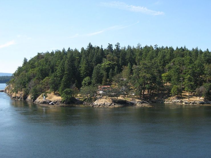 Home and a small lighthouse on the southern tip of Galiano Island