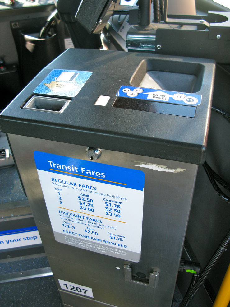 CMBC Bus Farebox - Lightly insert your ticket/daypass into the slot on the top left with the arrow down and the magnetic strip facing you. The ticket will be returned to you immediately and the farebox will indicate the validity to you and the operator
