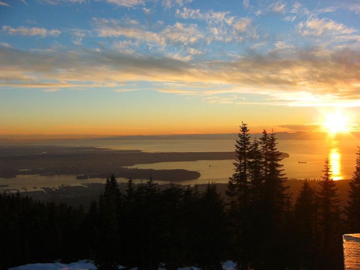 Spectaular sunset view of Vancouver and beyond from Grouse Mountain
