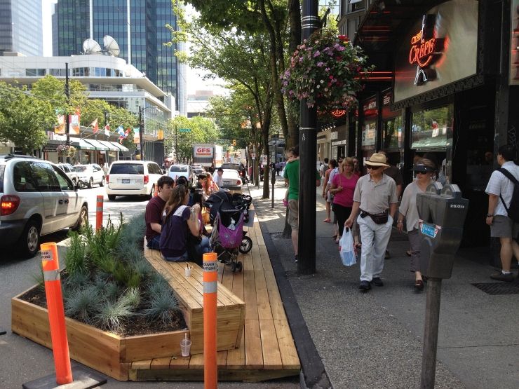 People enjoying a nice day along Robson Street in Vancouver