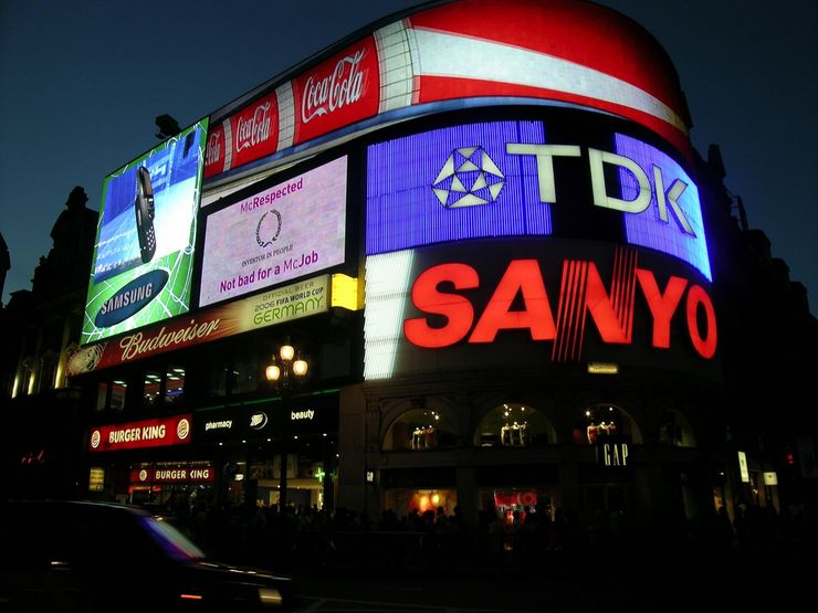 Bright Neon Lights of Piccadilly Circus at Night