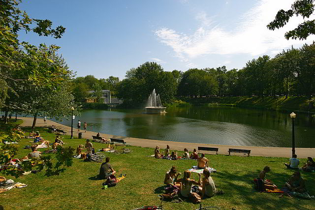 Relaxing by the water on a pleasant summer day in Parc Lafontaine