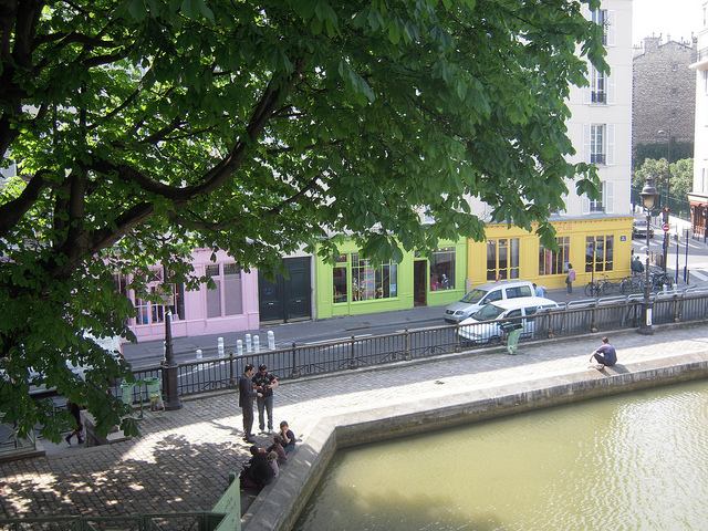 Colourful shops along Canal St Martin compete for your attention