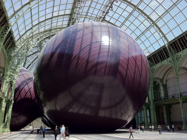 A giant temporary exhibit called Leviathan by artist Anish Kapoor inside the Galeries Nationales du Grand Palais