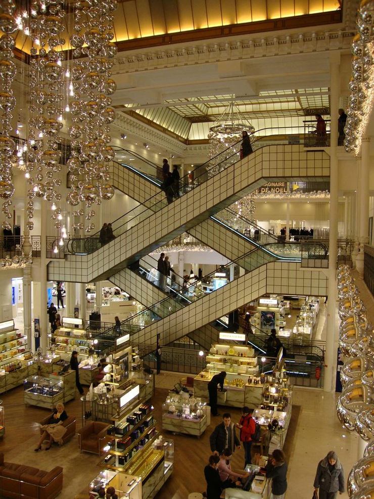 Escalators will get you to the many levels of shopping in Le Bon Marche