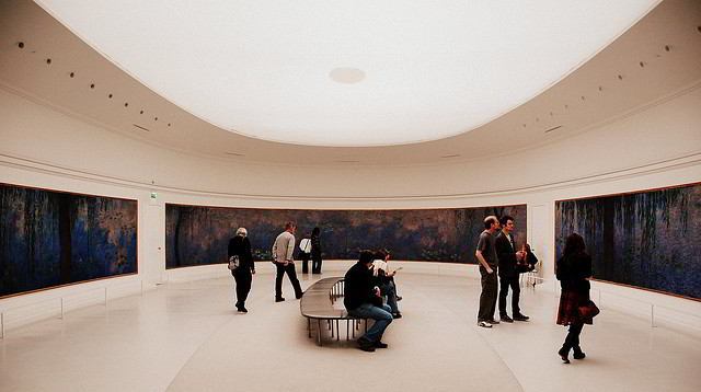 Viewing paintings by Monet inside the Musée de l'Orangeriein