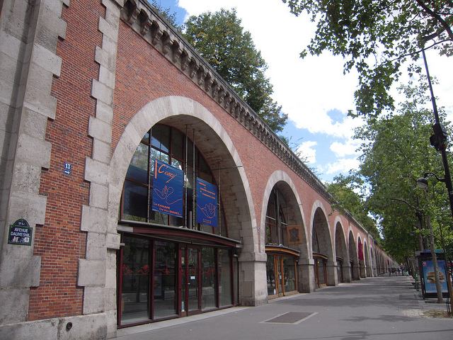 The western portion of the Promenade Plantee runs on top of this brick viaduct that parallels Avenue Daumensnil